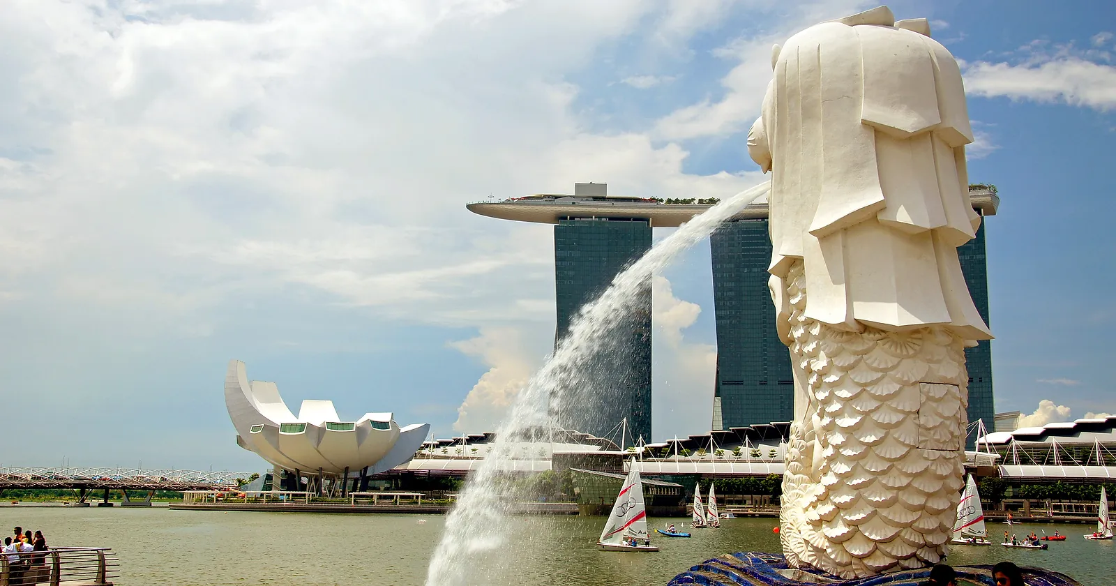 The Merlion fountain with Marina Bay Sands and the ArtScience Museum across Marina Bay, Singapore